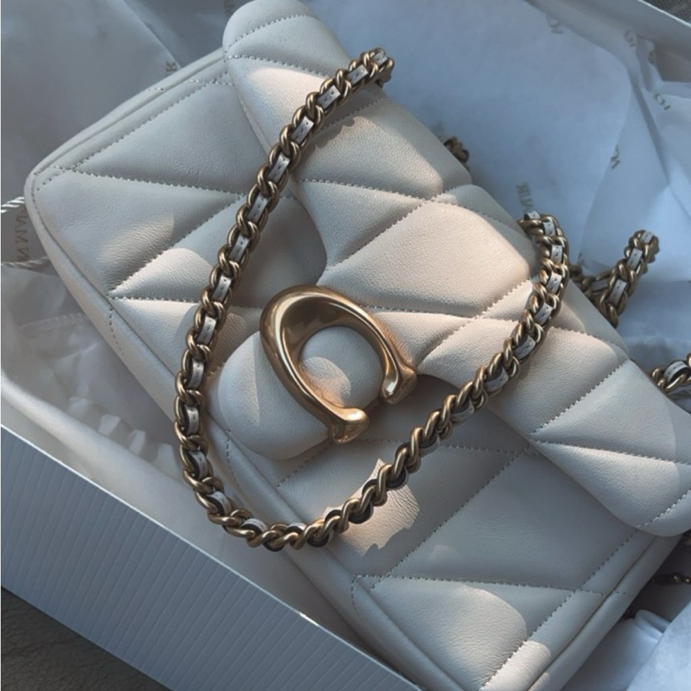 Elegant White Quilted Coach Bag